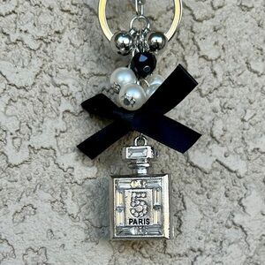 Luxury Silver Perfume Bottle Keychain/Bag Charm with Black Bow